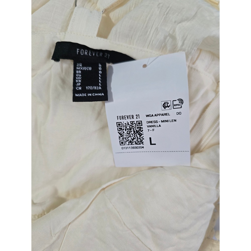 Forever 21 Vanilla Mini Dress Lace Up Back Pom Pom Trim Cream Size L NWT - Picture 15 of 16